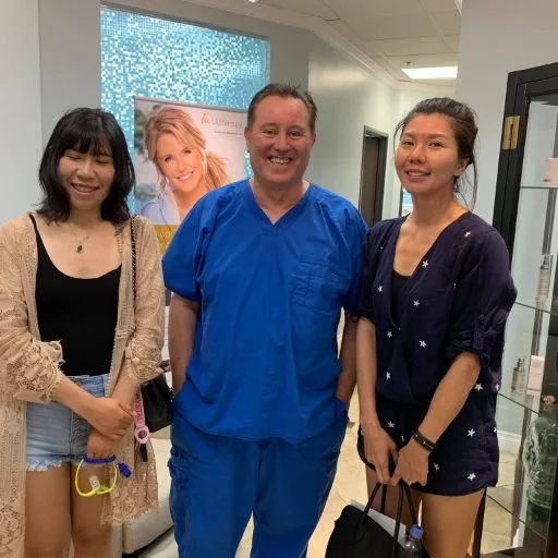 James Hooper with two young clients in the studio