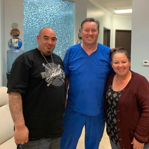 James Hooper with a couple visiting the studio