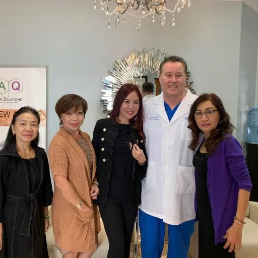 A group of clients with the team at the studio