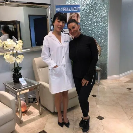 A team member with a client in the lounge area