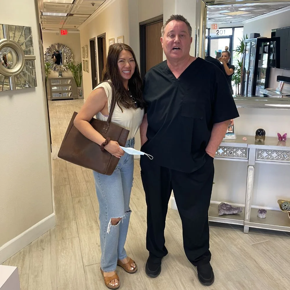 A client with James Hooper after her appointment