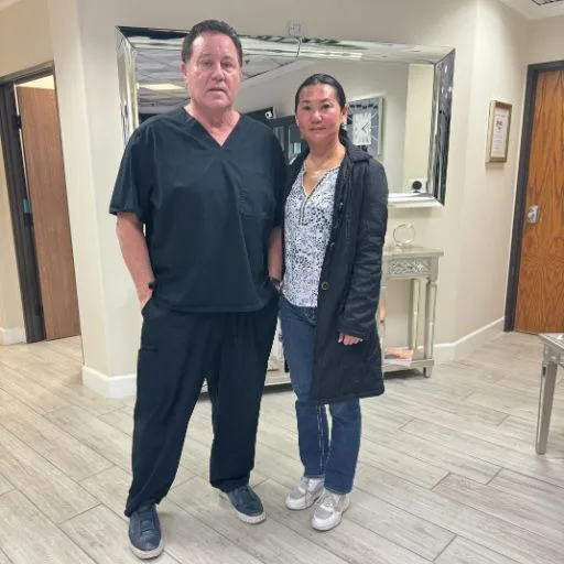 A client with James Hooper in the hallway