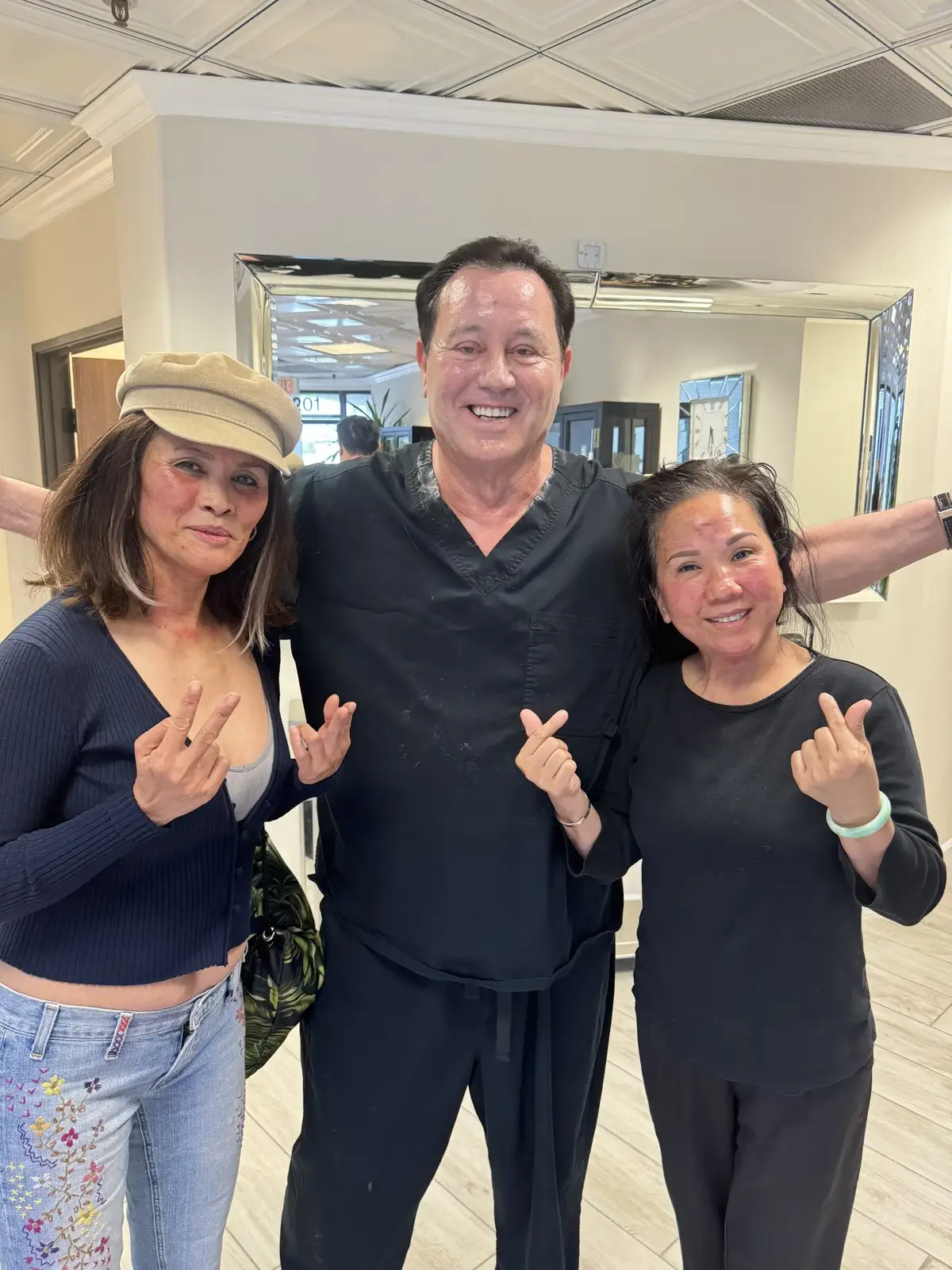 James Hooper with two clients at the studio