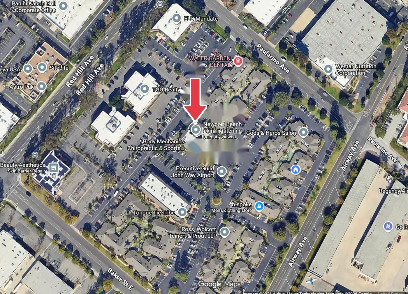 Satellite view of the Costa Mesa business center bounded by Red Hill Ave, Paularino Ave and Airway Ave, with a red arrow pointing to the Newport Beach Skin Tightening building at the center of the complex