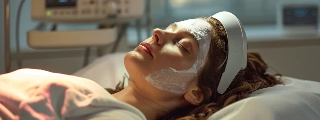 a patient lying comfortably on a clinic bed with ultrasound gel applied, as the device targets the eyebrow and neck areas during the ultherapy procedure.