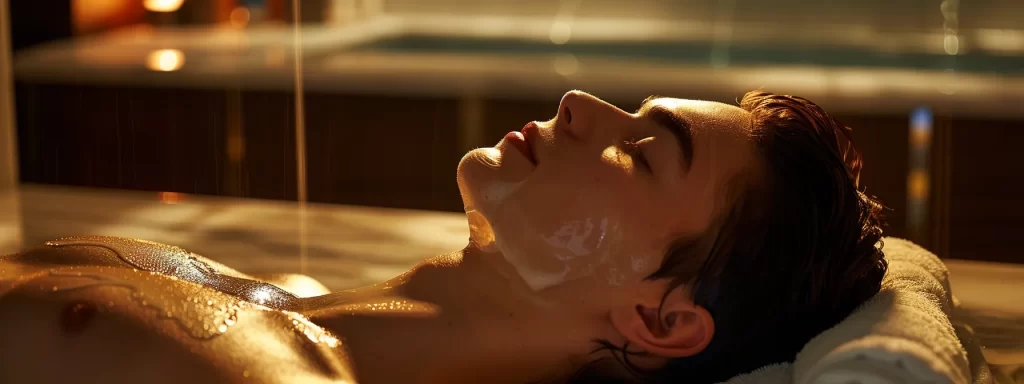 a person lying comfortably on a spa table, eyes closed with a serene expression, while a gentle laser treatment is being performed on their face.