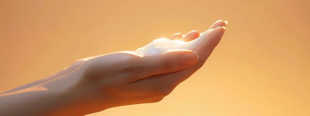 a hand gently massaging skin tightening cream into smooth, youthful skin for optimal absorption.